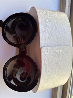 Prada Black Round Frame Sunglasses with White Textured Case